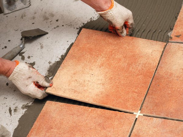 Start fixing tiles, marbles, and interlocking slabs (paving stones) and others